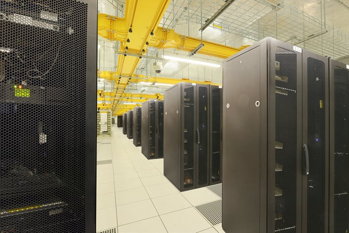 Data center server racks, in HKT Skyexchange Networked facilities management centers